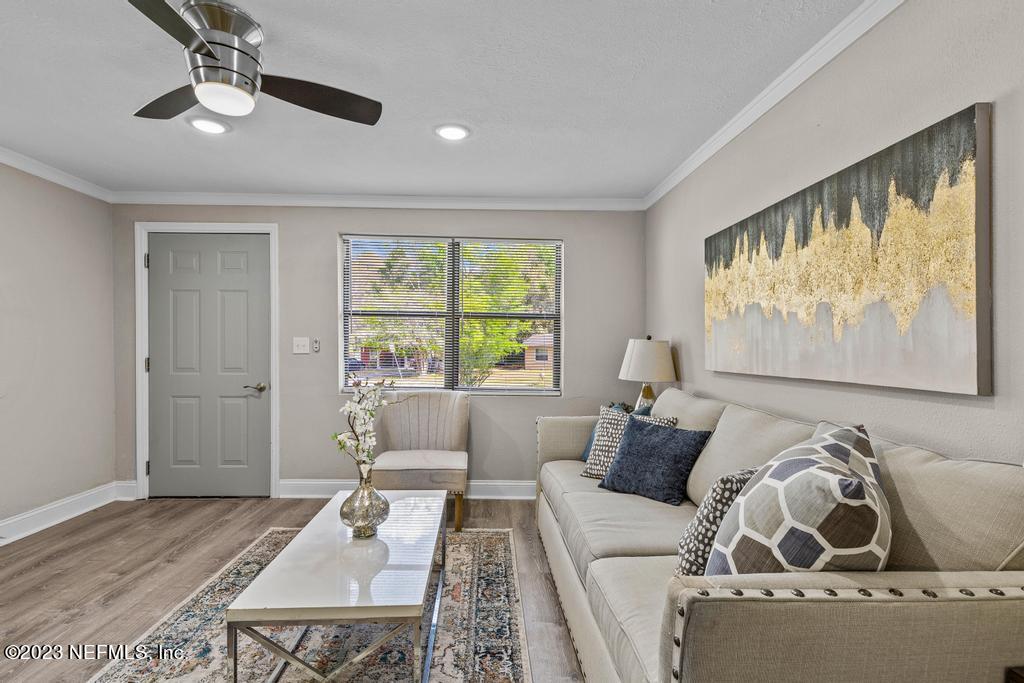 2142 Benedict Road Jacksonville, FL 32209 - Photo 9 of 34 a living room with furniture and a window
