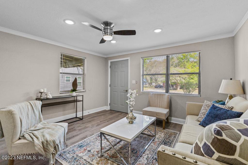 2142 Benedict Road Jacksonville, FL 32209 - Photo 10 of 34 a living room with furniture and a window