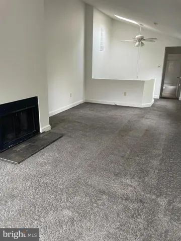 a view of a room with an empty space