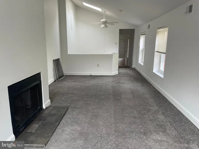 an empty room with windows