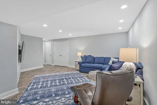 a living room with furniture and a couch