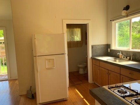 5004 A Awawa Road Eleele, HI 96705 - Photo 13 of 24 a bathroom with a sink a toilet and a shower