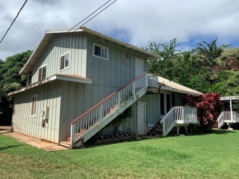 5004 A Awawa Road Eleele, HI 96705 - Photo 2 of 24 a front view of house with yard and green space