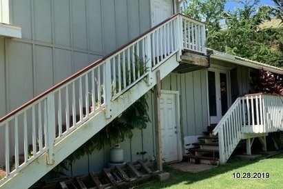 5004 A Awawa Road Eleele, HI 96705 - Photo 23 of 24 a view of a house with wooden floor in a yard