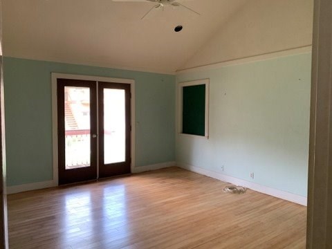 5004 A Awawa Road Eleele, HI 96705 - Photo 10 of 24 an empty room with wooden floor and windows