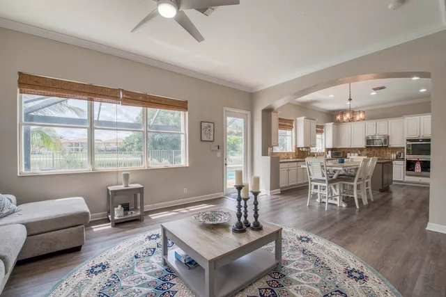 a living room with furniture and a table