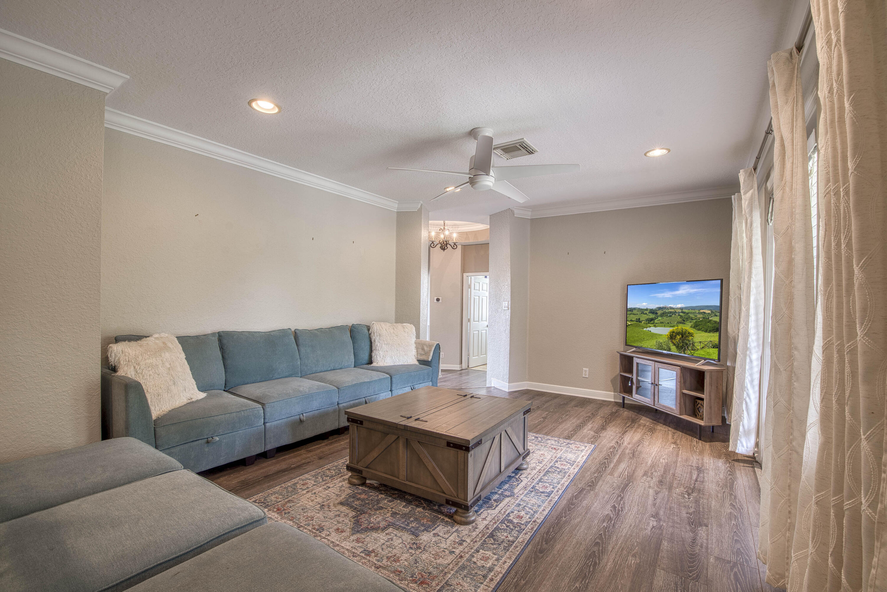 410 Cresta Circle West Palm Beach, FL 33413 - Photo 21 of 46 a living room with furniture and a wooden floor