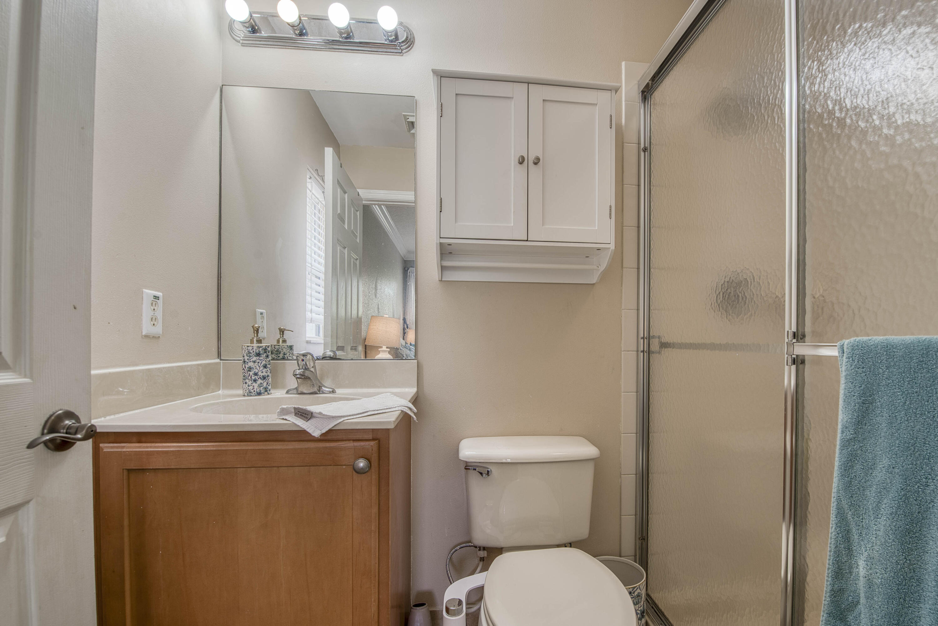 410 Cresta Circle West Palm Beach, FL 33413 - Photo 30 of 46 a bathroom with a granite countertop sink toilet and shower