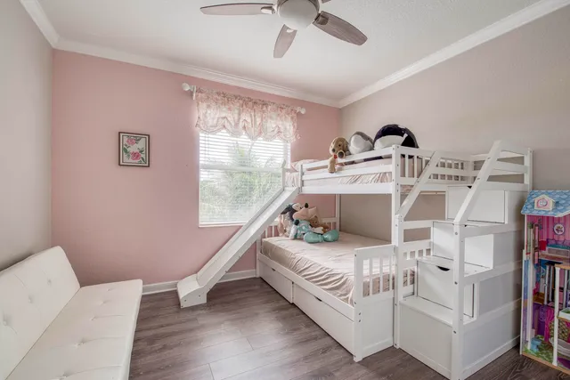 a bed room with a bed and a window