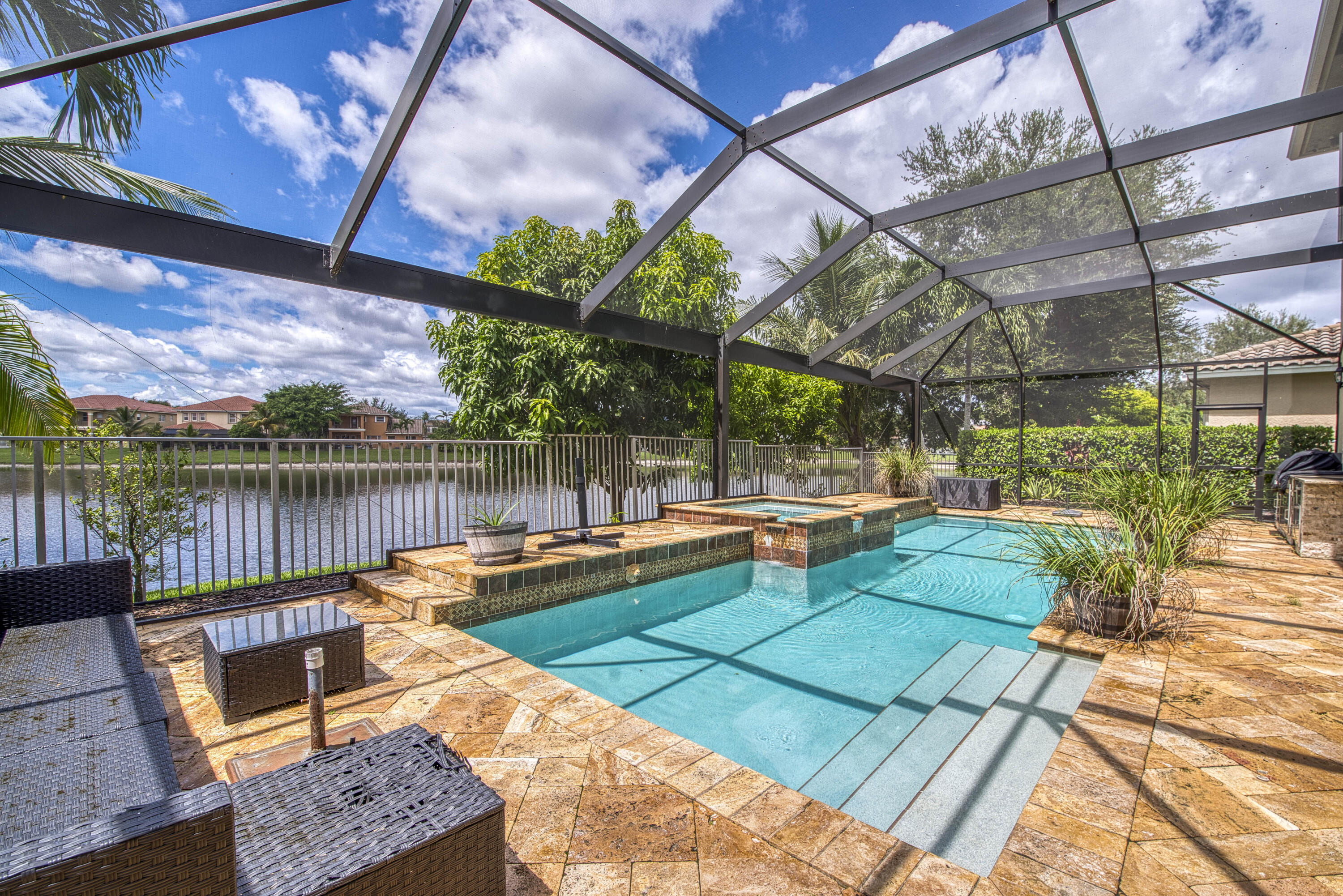 410 Cresta Circle West Palm Beach, FL 33413 - Photo 35 of 46 a view of swimming pool with a patio and a yard