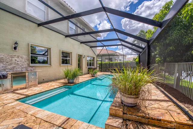 a view of a chairs and table in the patio