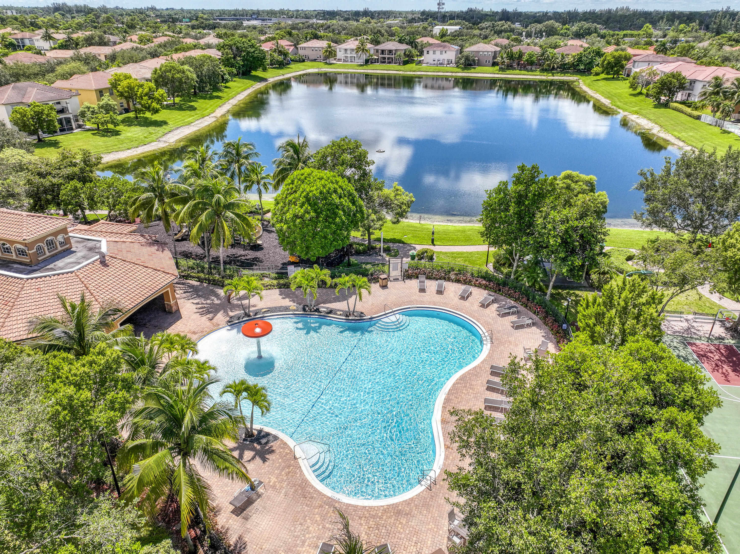 410 Cresta Circle West Palm Beach, FL 33413 - Photo 42 of 46 an aerial view of a house with a lake view