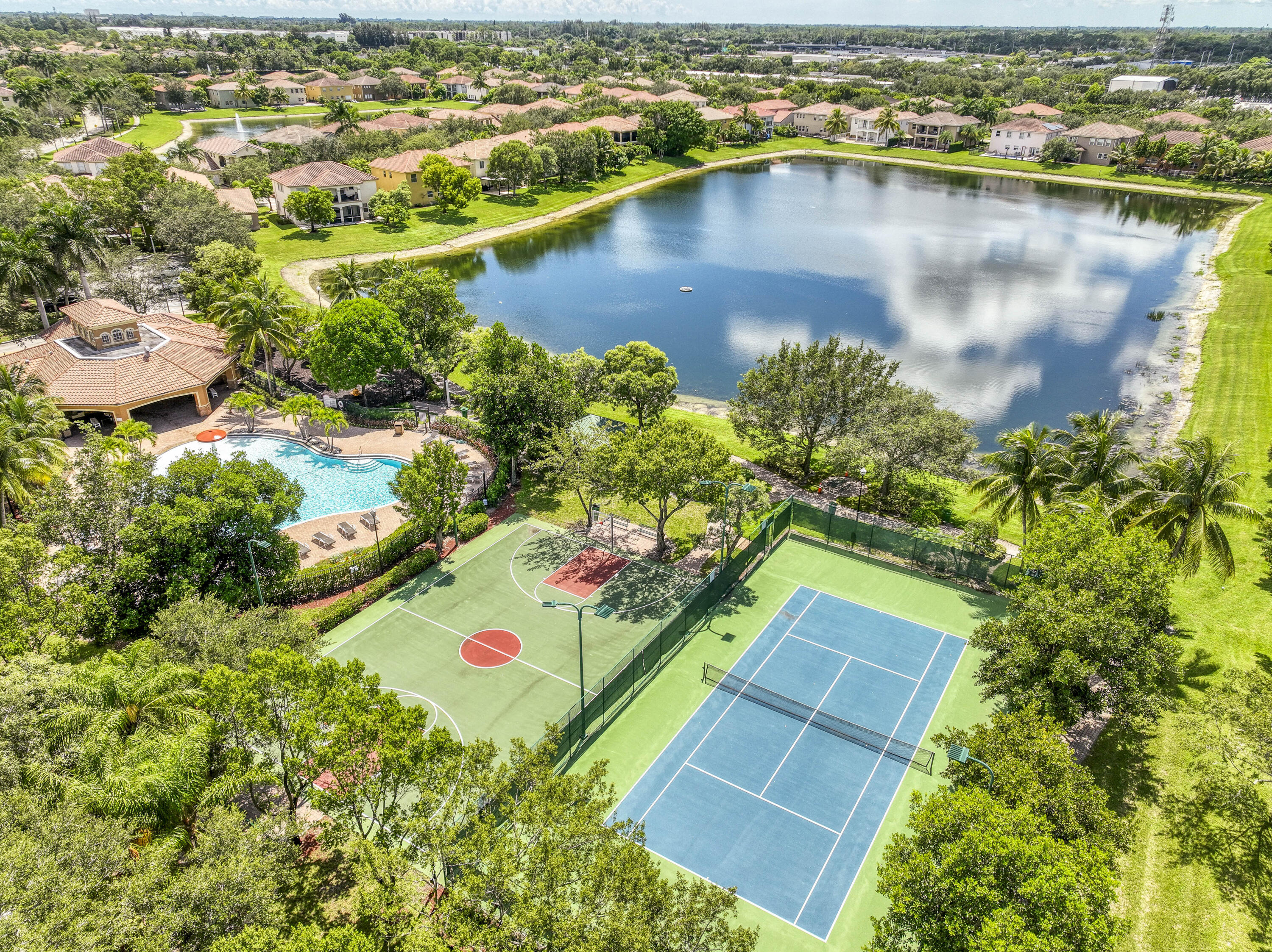 410 Cresta Circle West Palm Beach, FL 33413 - Photo 44 of 46 an aerial view of residential houses with outdoor space and lake view