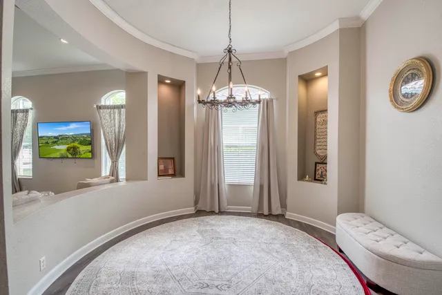 a view of a livingroom with furniture and window