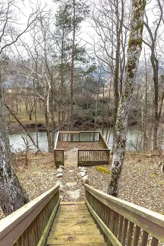 a view of balcony with wooden floor