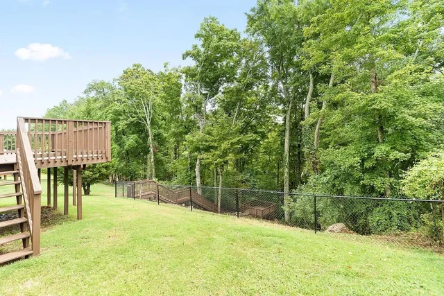 a view of a garden with a slide