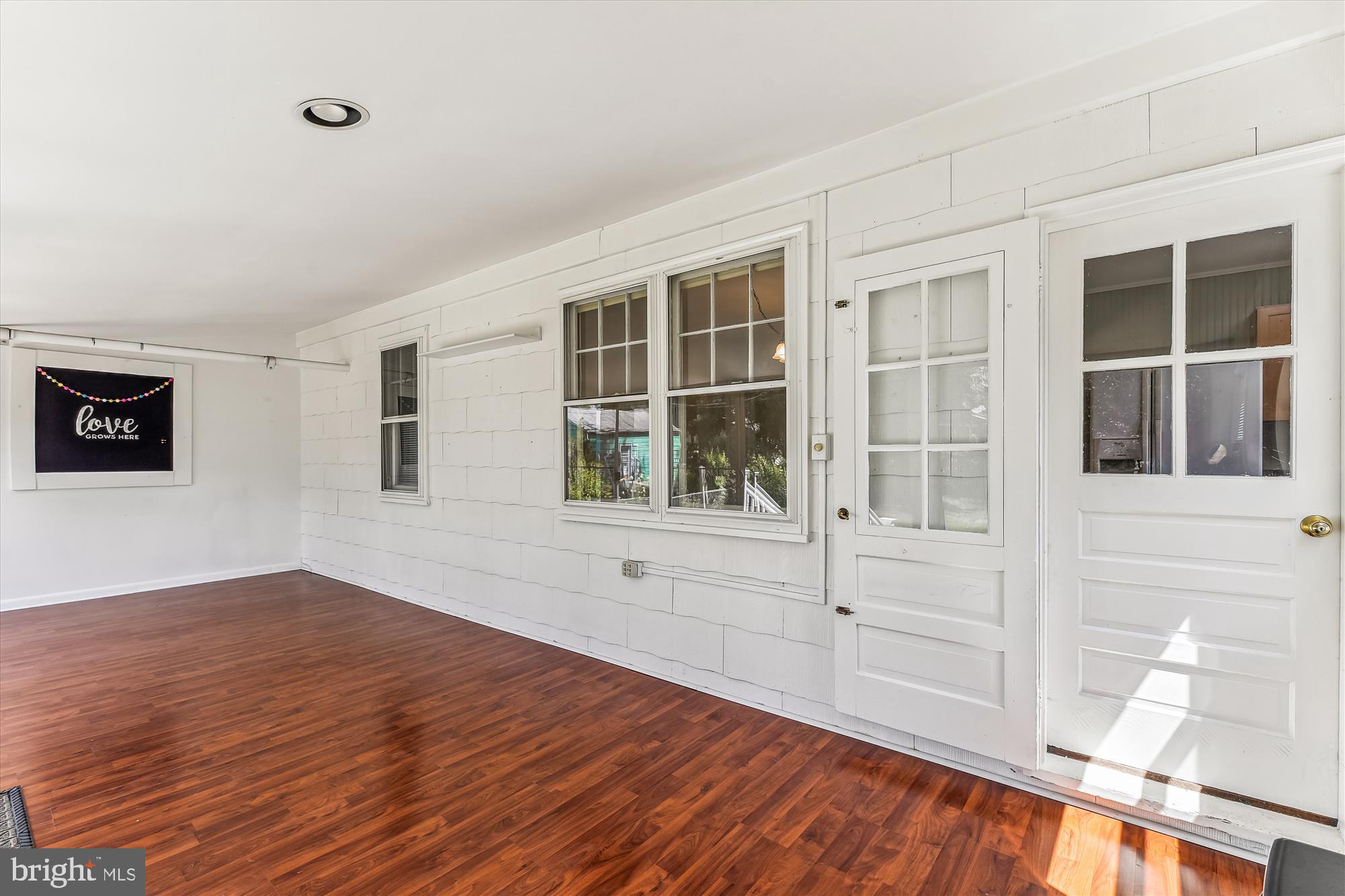 435 Cleveland Road Linthicum Heights, MD 21090 - Photo 14 of 24 Sunroom in rear of home