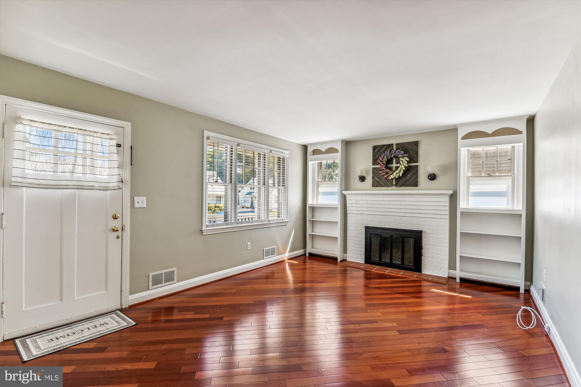 435 Cleveland Road Linthicum Heights, MD 21090 - Photo 3 of 24 Cozy living room w/wood flooring and built-ins