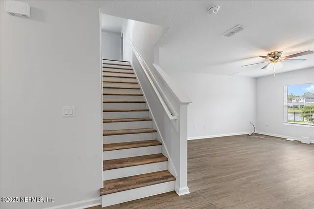 a view of entryway with wooden floor