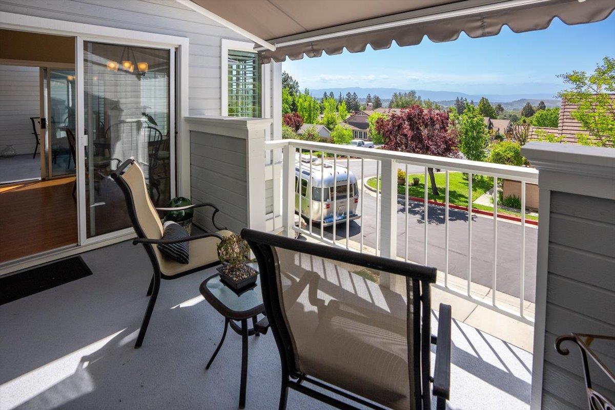 7829 Prestwick Circle San Jose, CA 95135 - Photo 17 of 34 a view of a balcony with chairs and wooden floor