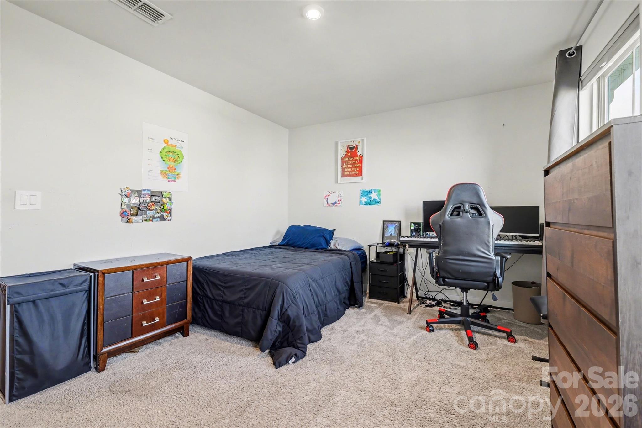 1840 Scarbrough Circle Southwest Concord, NC 28025 - Photo 22 of 29 a bedroom with a workspace