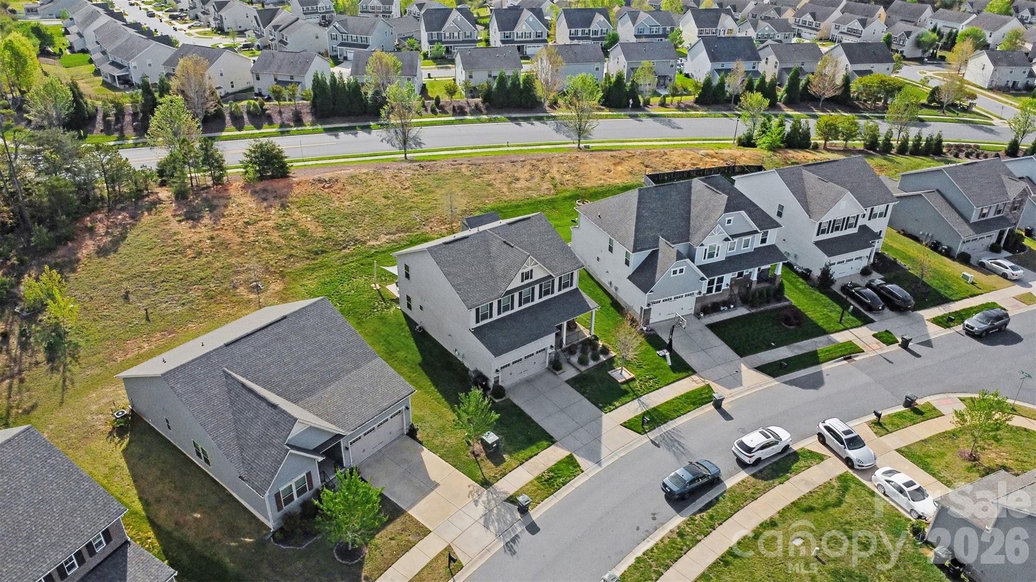 1840 Scarbrough Circle Southwest Concord, NC 28025 - Photo 27 of 29 an aerial view of a house with a swimming pool