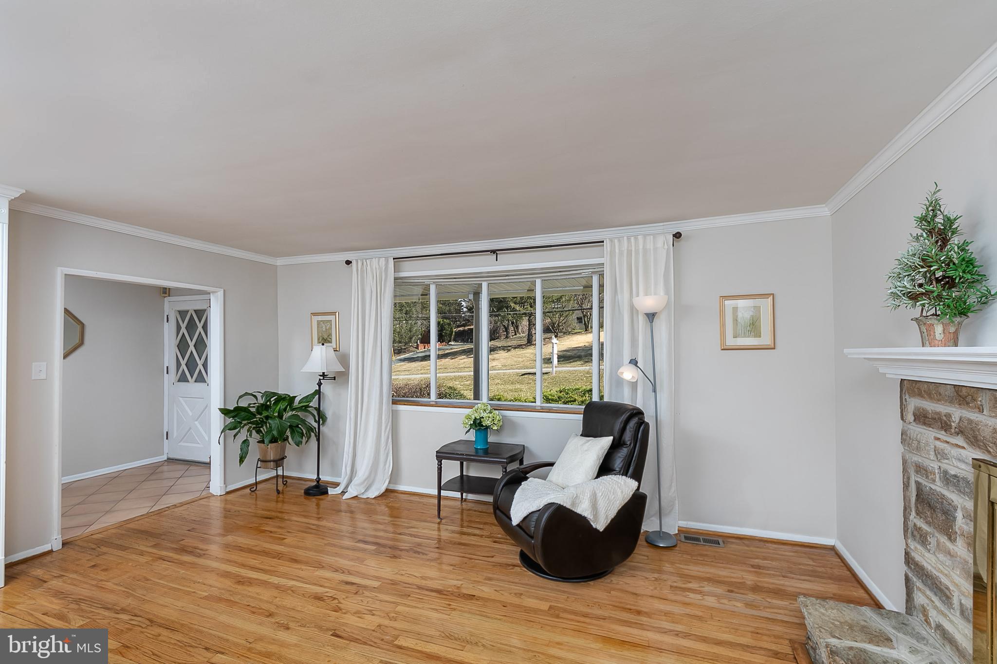 2402 Pot Spring Road Lutherville-Timonium, MD 21093 - Photo 14 of 41 Living Room with Wood Burning FP
