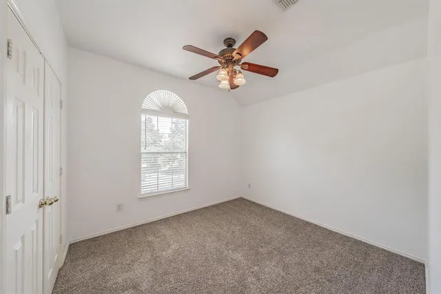 a view of a window in an empty room