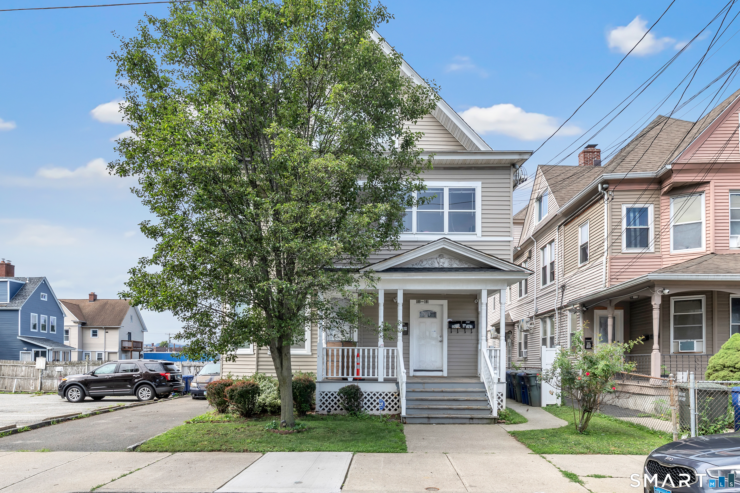 189 Wells Street Bridgeport, CT 06606 - Photo 2 of 40 Extremely well-maintained 3 Family House Offers 3,724 total sq ft above grade. Hardwood Floors on all 3 levels, Roof (2009), 2021 A 3 gas Hot water heaters, each unit equipped with washer/dryer, 3 gas & electric meters, very large basement