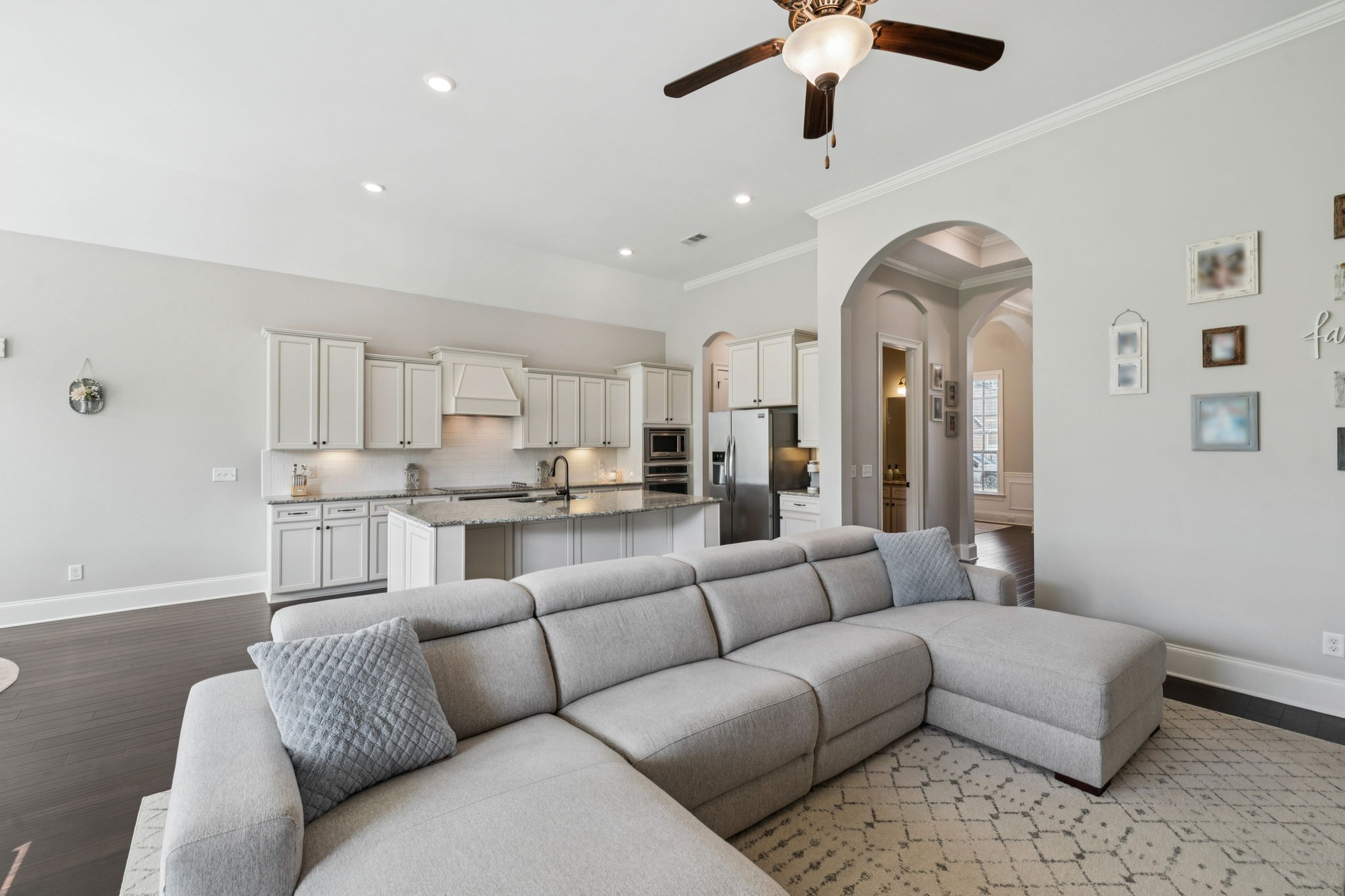 3639 Martins Mill Road Thompson's Station, TN 37179 - Photo 17 of 35 a living room with furniture and a chandelier