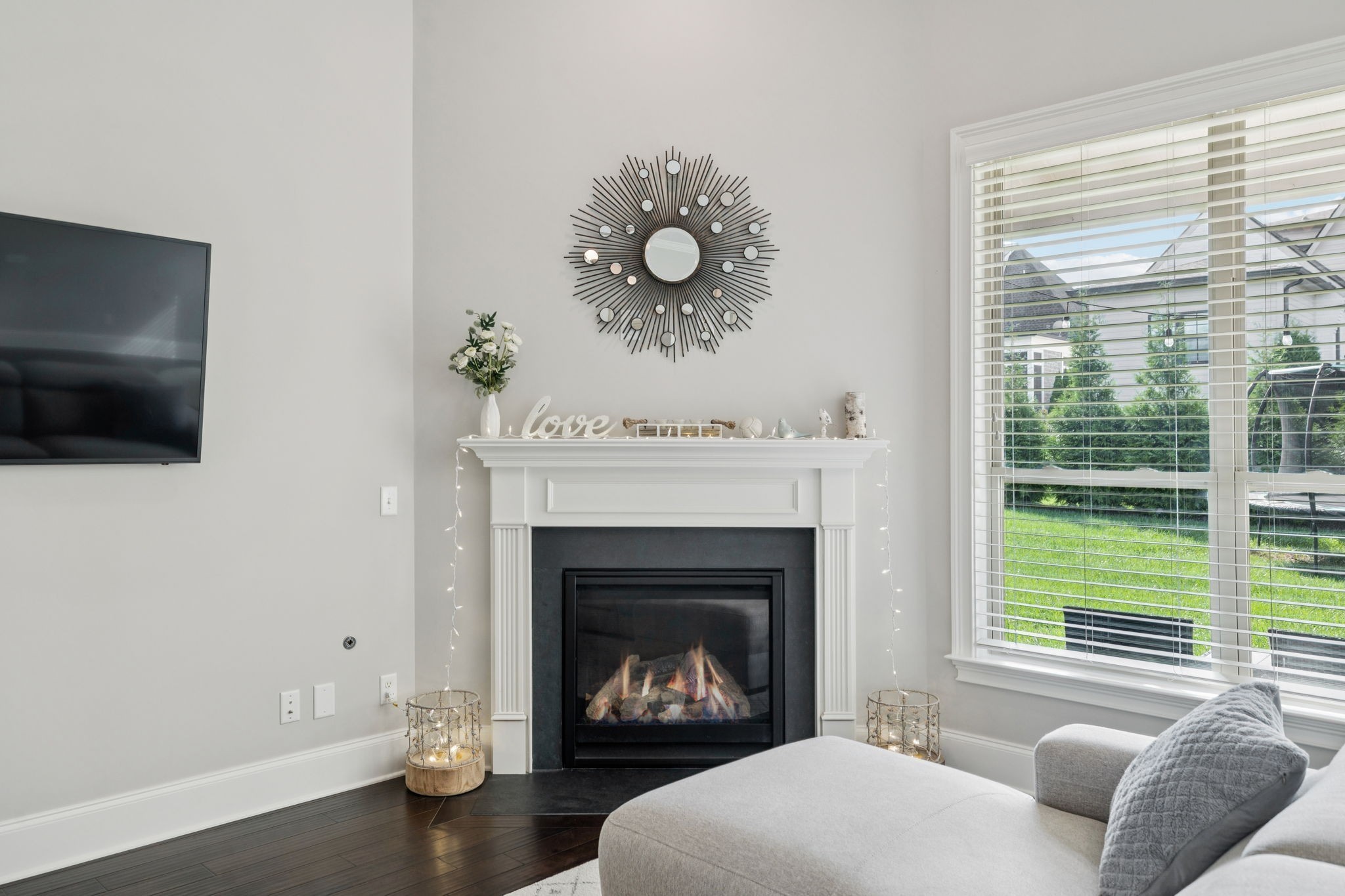 3639 Martins Mill Road Thompson's Station, TN 37179 - Photo 19 of 35 a living room with furniture a fireplace and a flat screen tv