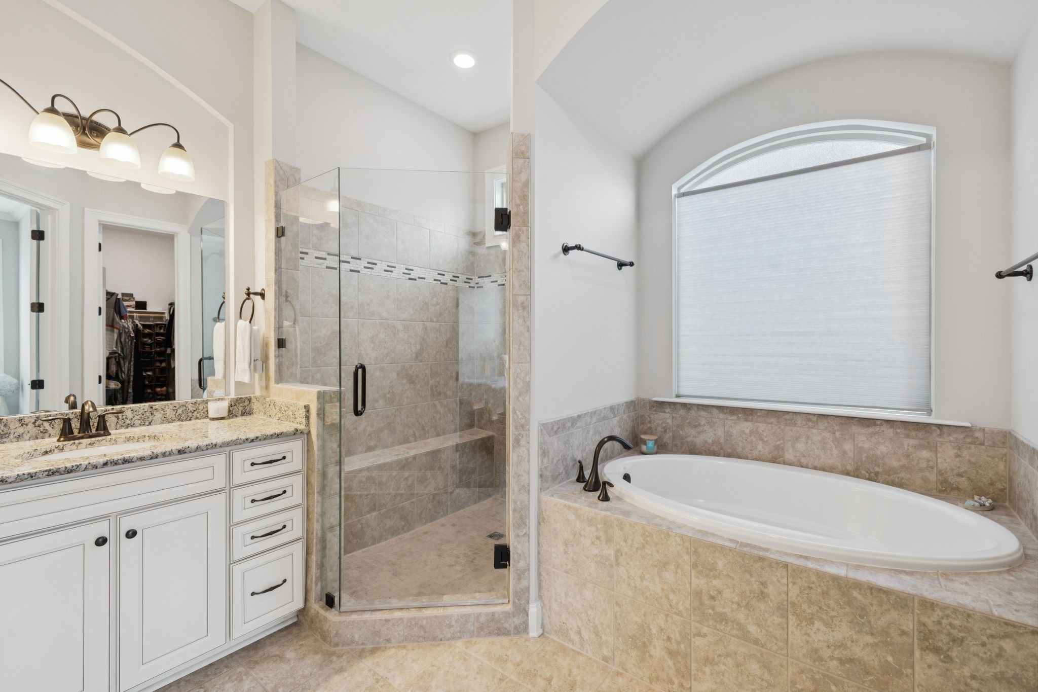 3639 Martins Mill Road Thompson's Station, TN 37179 - Photo 23 of 35 a spacious bathroom with a granite countertop tub shower and a sink