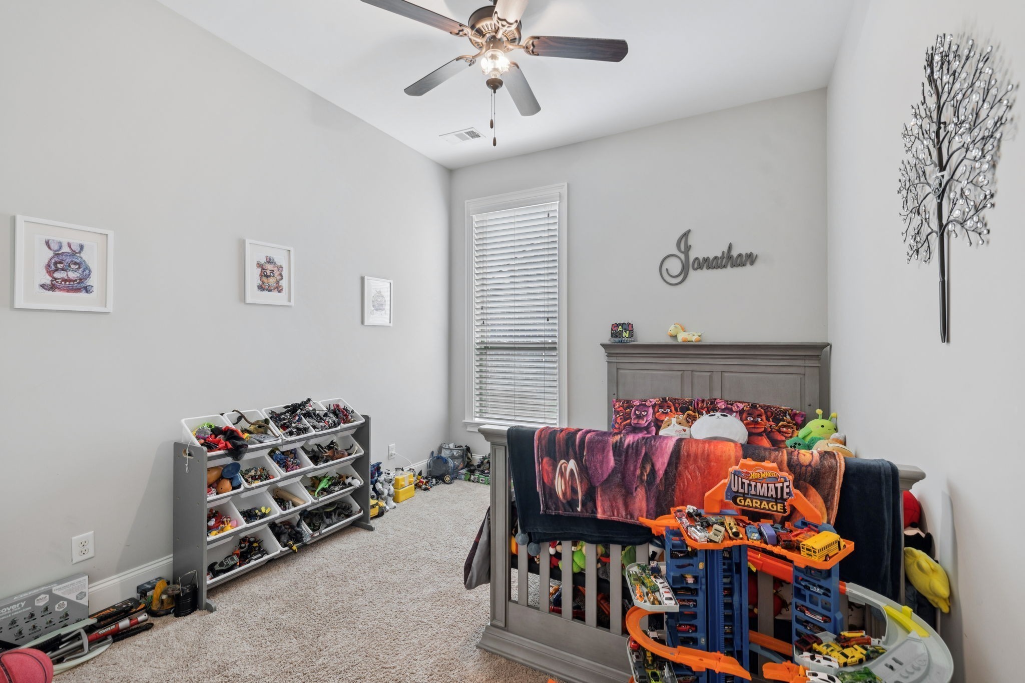 3639 Martins Mill Road Thompson's Station, TN 37179 - Photo 27 of 35 a bedroom with furniture and a chandelier