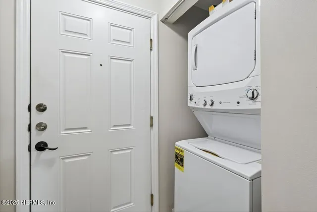 a view of a balcony with furniture