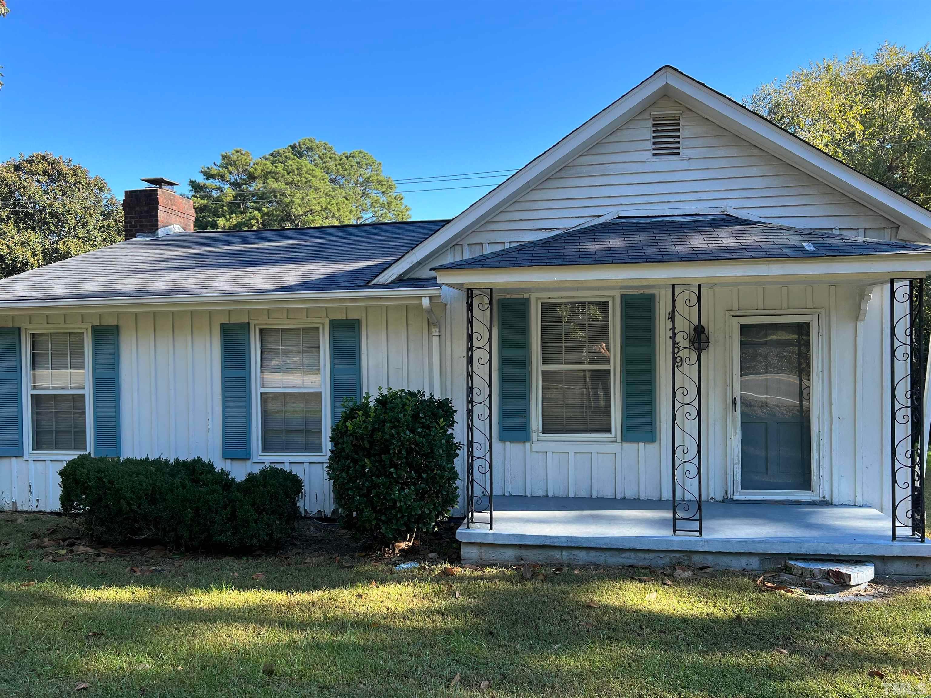 4359 Old Poole Road Raleigh, NC 27610 - Photo 1 of 13 a view of a house with a yard and plants