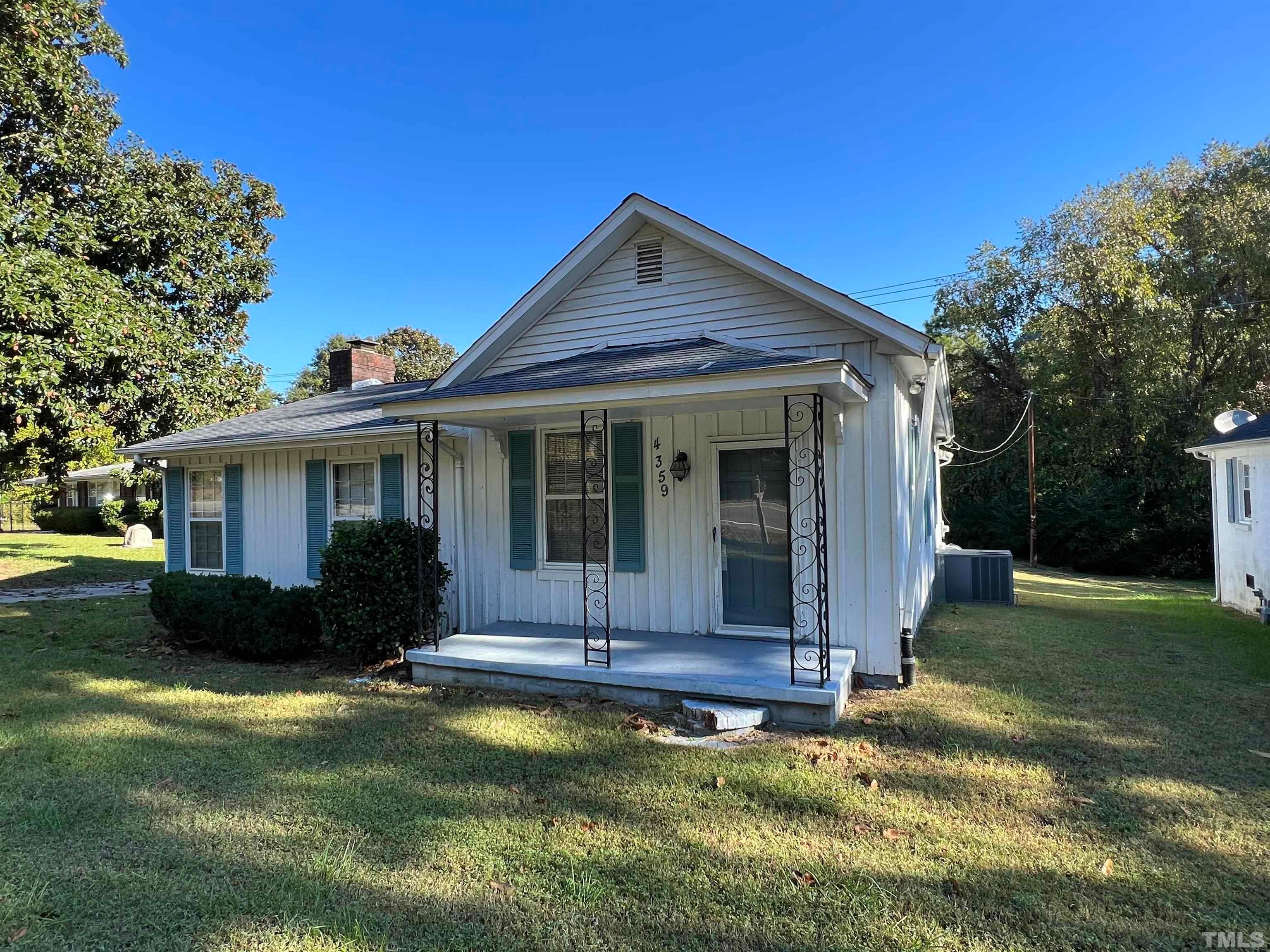 4359 Old Poole Road Raleigh, NC 27610 - Photo 2 of 13 a view of a house with backyard and garden