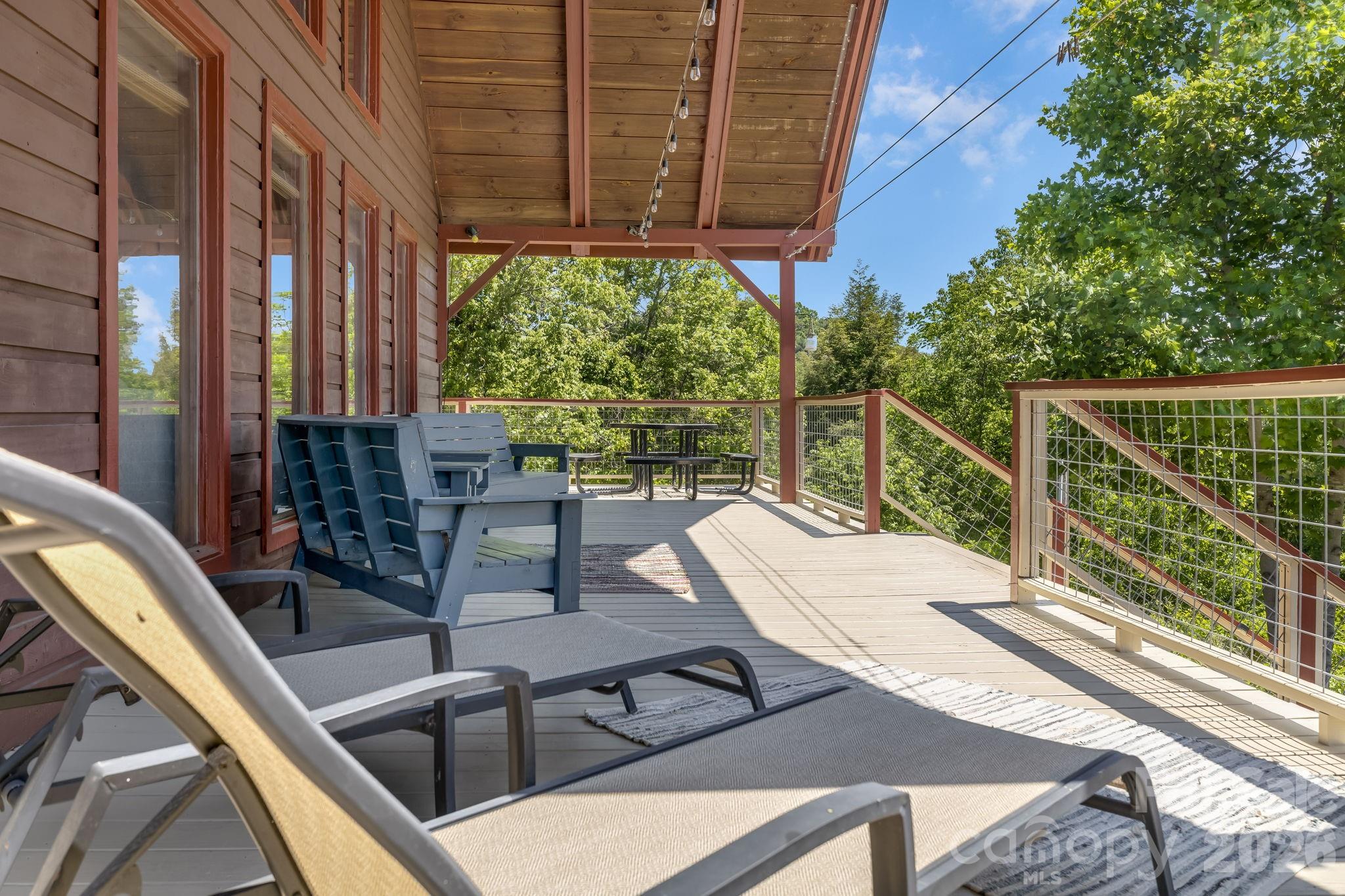 694 Boulder Road Marshall, NC 28753 - Photo 37 of 44 a view of balcony with couch