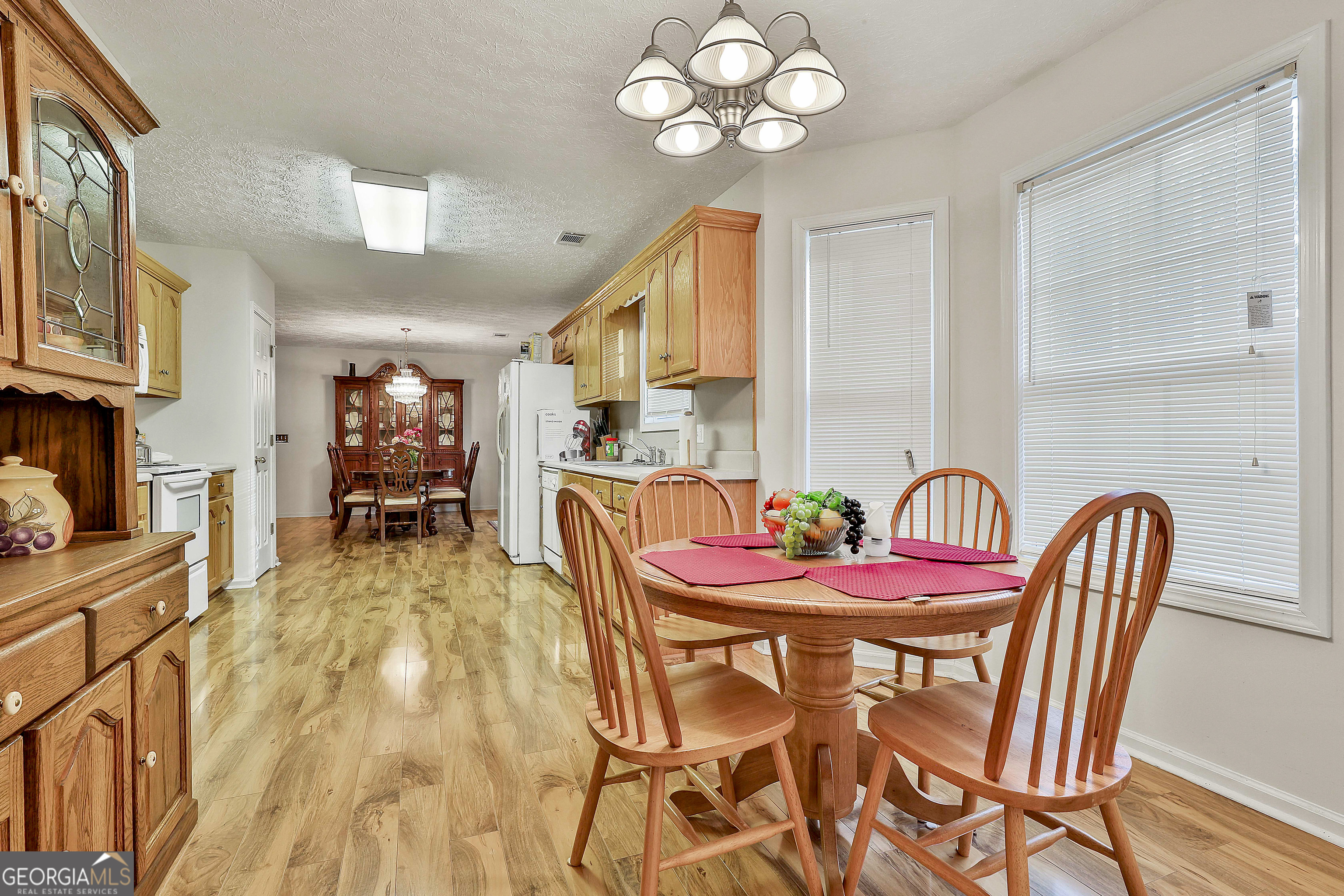 450 McKoy Road Newnan, GA 30263 - Photo 15 of 28 a view of a dining room with furniture
