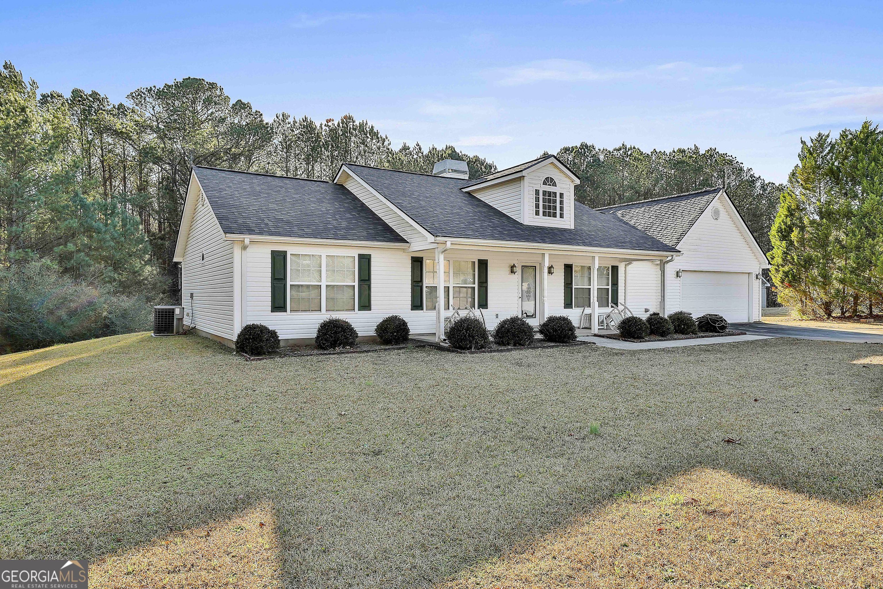 450 McKoy Road Newnan, GA 30263 - Photo 4 of 28 a view of a house with a yard