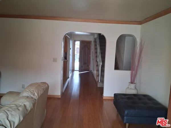 a view of livingroom with furniture and wooden floor
