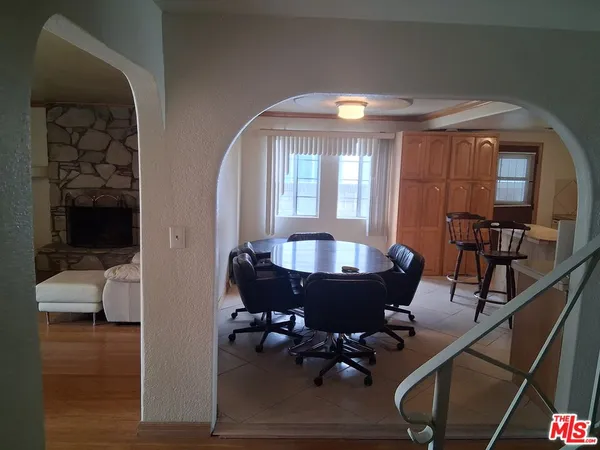 a room with furniture and wooden floor