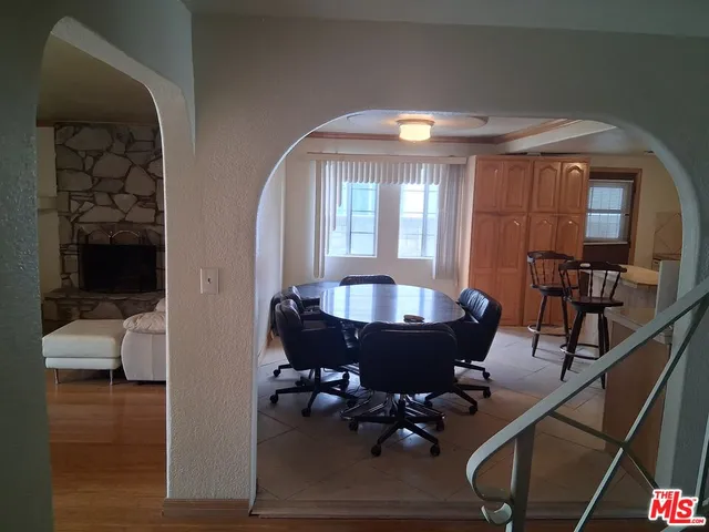 a room with furniture and wooden floor