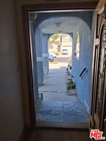 a view of a entryway door of a house