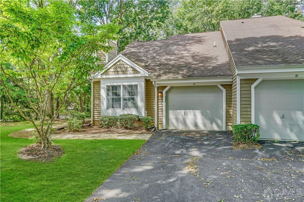 19 Stone Run Road Bedminster, NJ 07921 - Photo 17 of 17 a front view of a house with a yard and garage