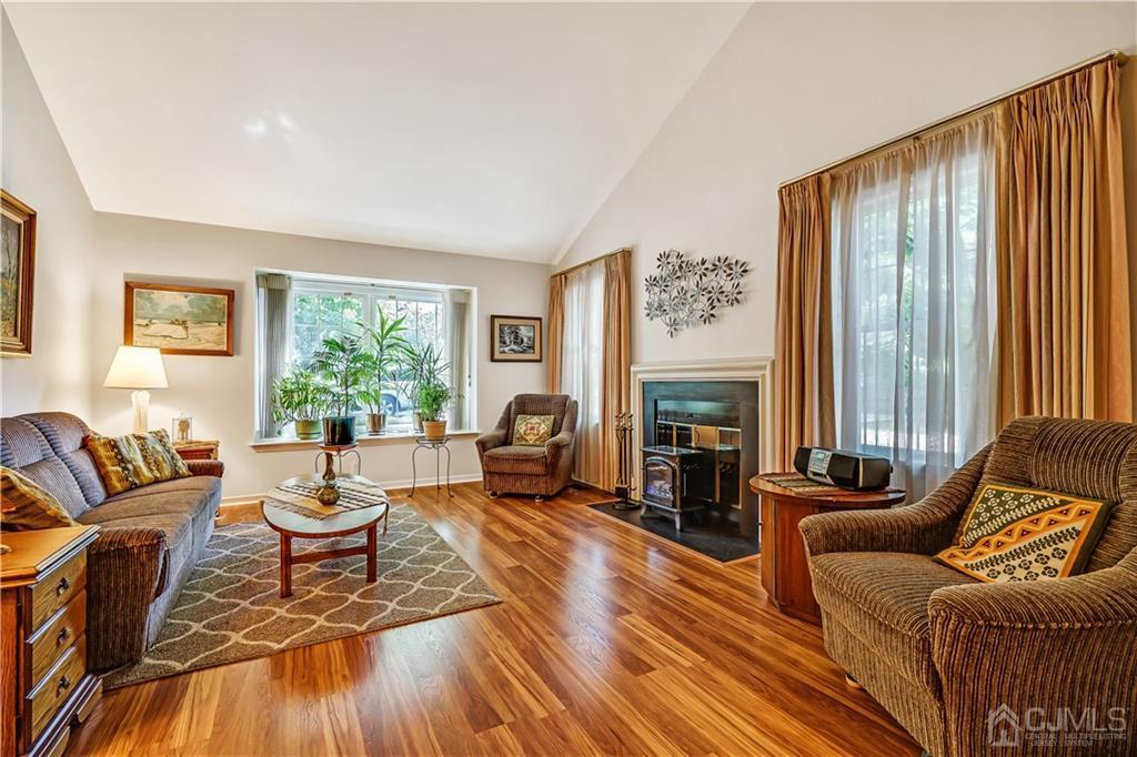 19 Stone Run Road Bedminster, NJ 07921 - Photo 3 of 17 a living room with furniture and a fireplace