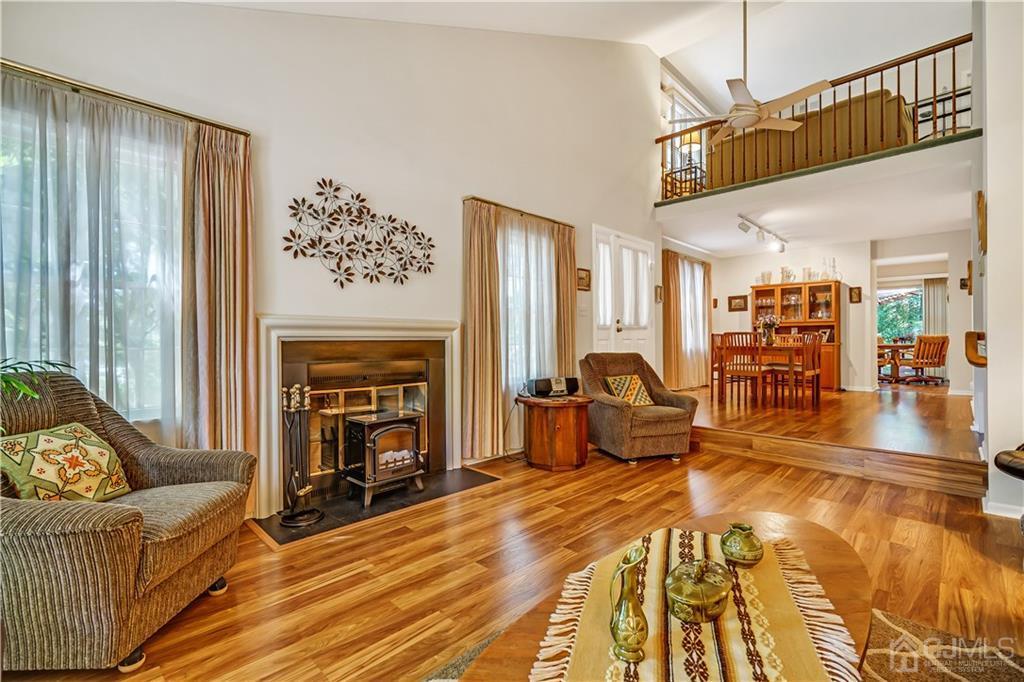 19 Stone Run Road Bedminster, NJ 07921 - Photo 5 of 17 a living room with furniture and a fireplace