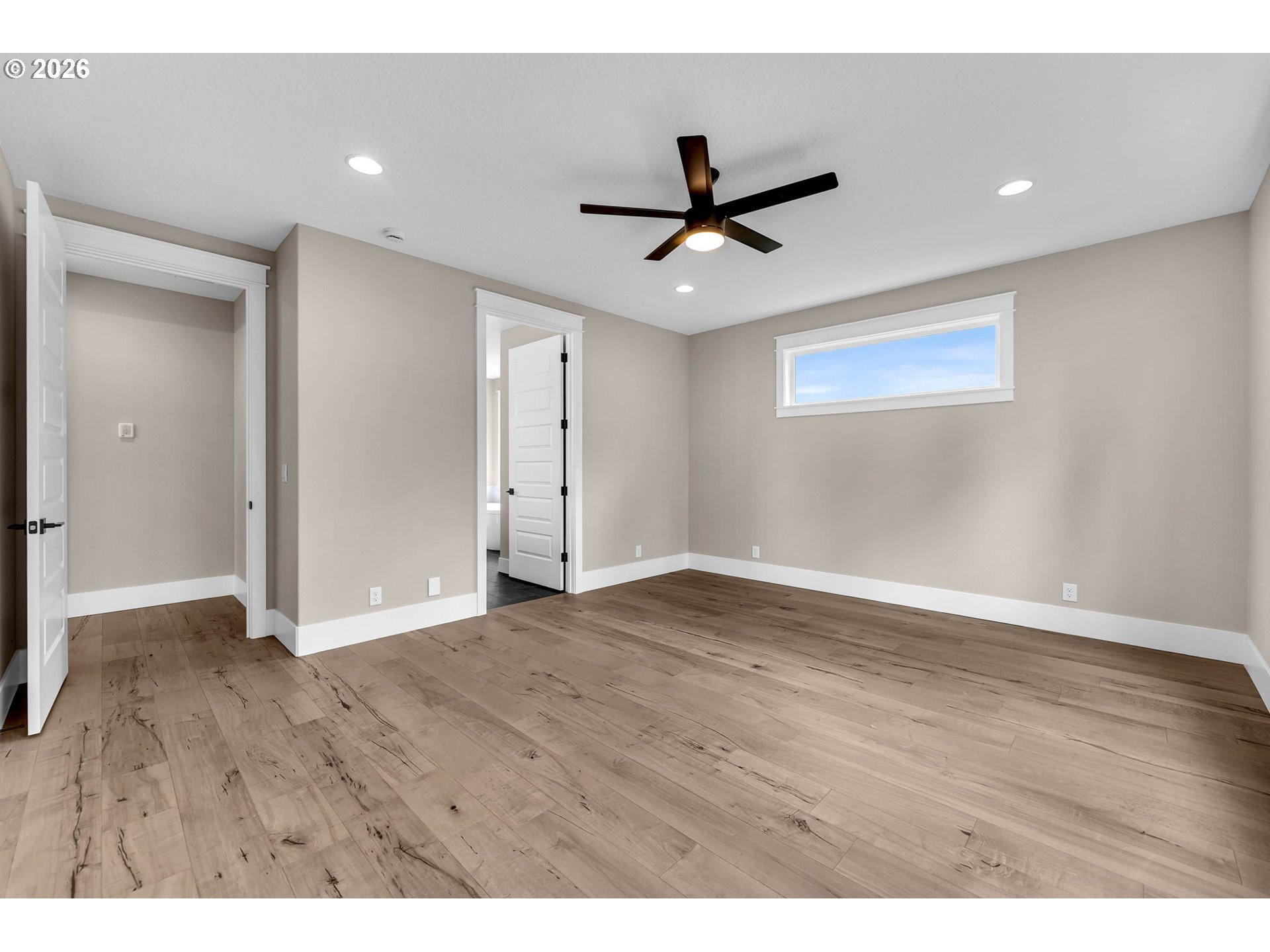16221 Northeast 180th Street Brush Prairie, WA 98606 - Photo 22 of 47 a view of an empty room with wooden floor