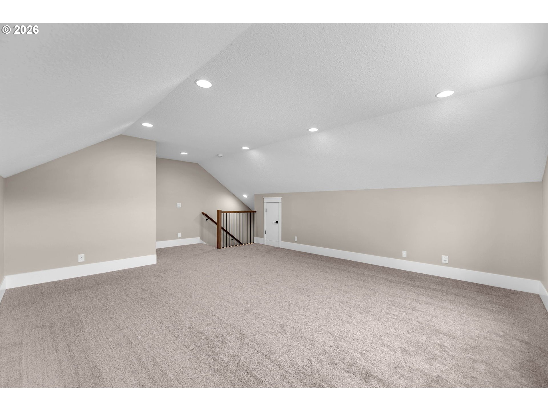 16221 Northeast 180th Street Brush Prairie, WA 98606 - Photo 39 of 47 a view of an empty room with wooden floor