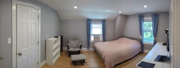 a room with furniture and a window