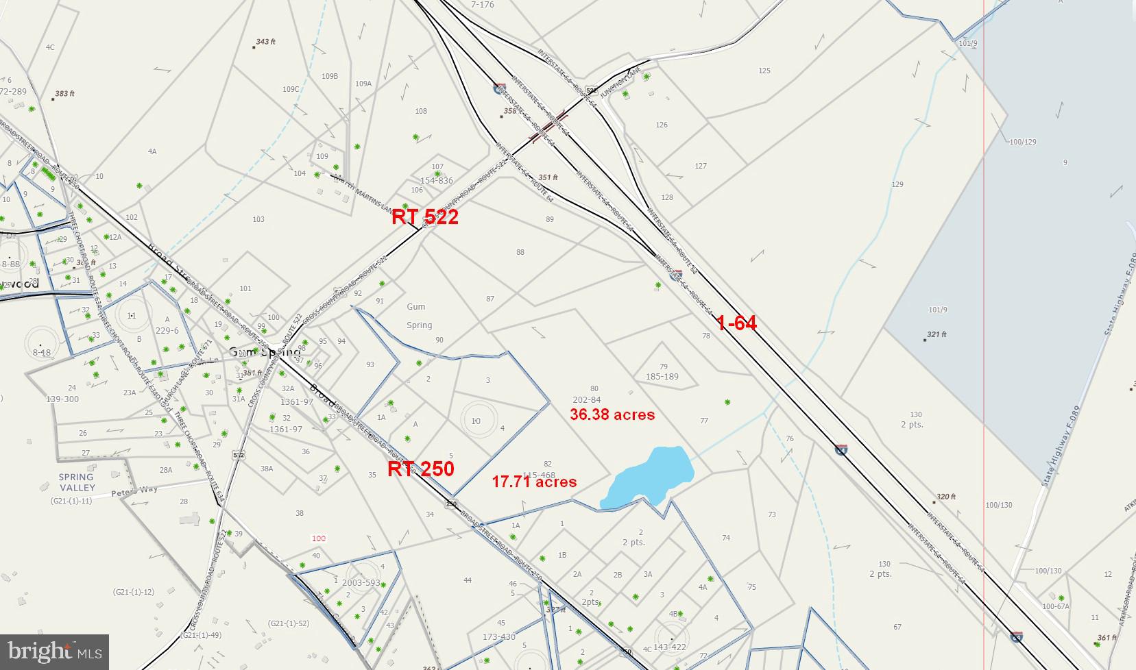 a white and white bath tub sitting next to a white wall